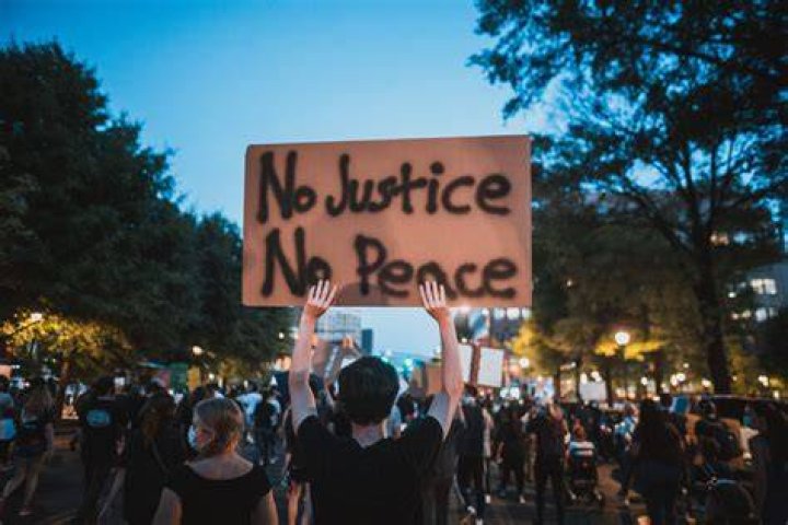 A protester holding a sign in Washington D.C.
