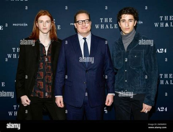 Actor Brendan Fraser, center, poses with his sons Leland Fraser, left, and Holden Fraser at the premiere of "The Whale" at Alice Tully Hall, in New York NY Premiere of "The Whale", New York, United States - 29 Nov 2022