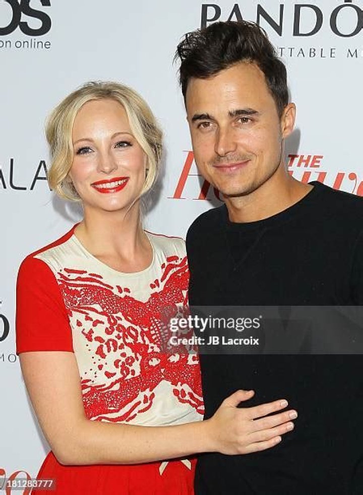 Candice Accola, left, and Joe King attend The Hollywood Reporter celebration of the Emmy nominees and new fall TV season presented by Samsung Galaxy, Asos, Porsche, Pandora and Ketel One,, at Soho House in West Hollywood, Calif The Hollywood Reporter Celebrates the 65th Primetime Emmy Awards Nominees presented by Samsung Galaxy, Asos, Porsche, Pandora and Ketel One Inside, West Hollywood, USA - 19 Sep 2013