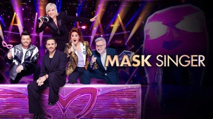 THE MASKED SINGER: L-R: Host Nick Cannon and Hayley Orrantia in THE MASKED SINGER season finale episode airing Wed. May 18 (8:00-9:00 PM ET/PT) on FOX. CR: Michael Becker / FOX. &copy; 2022 FOX MEDIA LLC. CR: FOX.